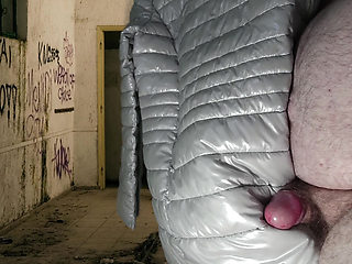 Cumshot on her silver shiny down jacket. (Down Jacket Fetish)