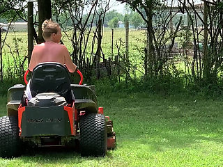 Titties out Riding lawnmower outdoors
