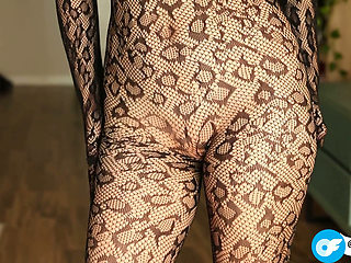 I'm Posing in a Black Fishnet Bodysuit and Heels, Pleasuring Myself with My Fingers