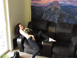 slow strip tease out of a sweater and jeans