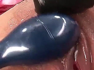 Asian teen made to squirt with toys at BDSM party