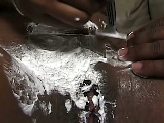 Curly MILF Gets Shaved Smooth Before Massive Facial