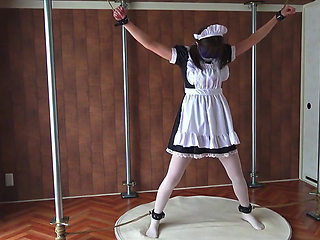 A Restrained Maid Writhing in Pleasure From a Remote-controlled Vibrator