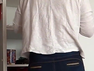 After Urinating, the Stepmother Puts on Very Tight Jeans, Revealing Her Panties
