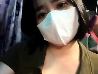 Teen on the bus hinting at showing breasts and being sensual