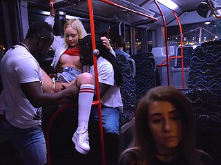 Antonio Black pounds Emily Cutie's tight ass in a steamy threesome on the city bus