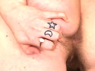 Busty Redhead MILF in a Corset Plays Solo