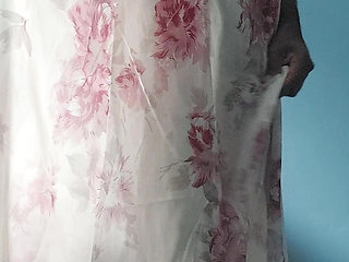 I'm masterbating in a flowery flowing silky seethrough fleard skirt and cum