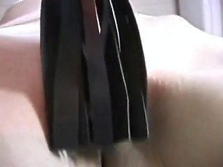 Skinny girl gets pussy pinched while she's tied down