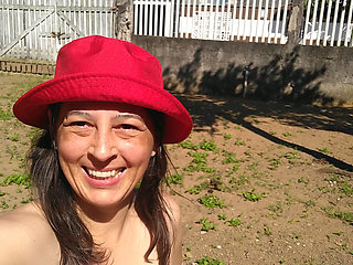 My wife sunbathing completely naked in front yard