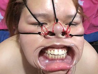 Fucking her face with a beautiful bondage style