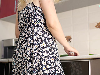 Blonde Slut in the Kitchen Fucks Herself with a Huge Cucumbe