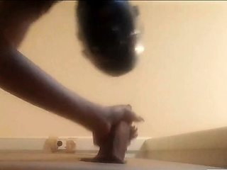 High-Heeled Milf Sucks and Fucks in a Catsuit at a Gloryhole