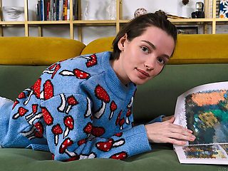 Beautiful slender brunette Ana Moloko stimulates her shaved pussy