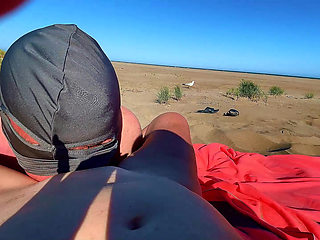 My cuckold licks on the beach