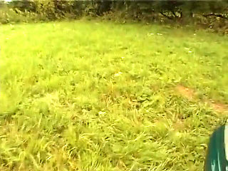 Granny sucks a chunky cock then gets fucked in the bushes