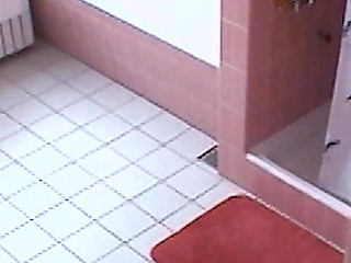 Amateur blonde masturbates on toilet