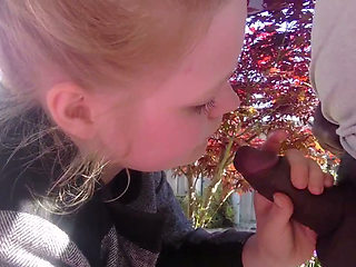 Blond teen sucking Black Cock in Garden Blowjob
