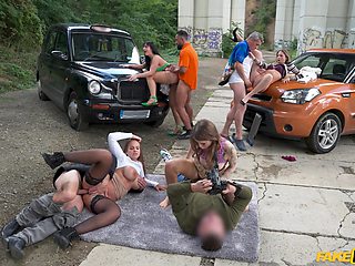 Eden Ivy and Rebecca Volpetti go outdoor in a car for a wild group sex