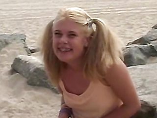 Little Summer fingering her pussy hard at the beach