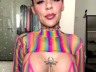 Inked Hottie with Buns Teases in Shiny Rainbow Mesh Top