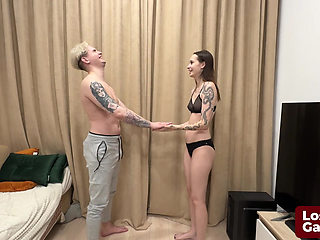 James and Sofia engaged in a strip hand-slap game