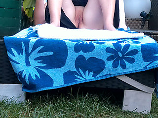 Outdoors on a Lounge Chair