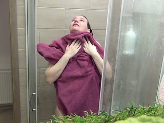 Hot blonde with natural tits showers and takes a bath