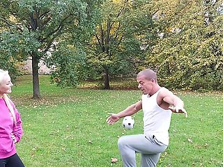 Blondie takes a juicy cock in her mouth while getting pounded from behind