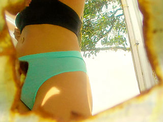 RECORDED IN AN OUTDOOR BOOTH TALKING ON A CELL PHONE