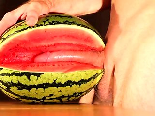 Muscular Stud Fucks and Cums on Watermelon