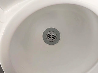 Moaning daddy has a lot of pressure and milks his cock in the public toilet