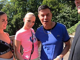 Two girls having fun with a guy in the forest, wild threesome