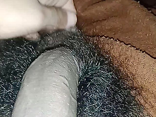Masturbating hairy cock with small balls