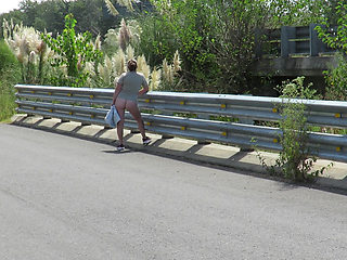 Patricia on the bridge over the road