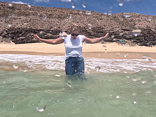 Girl Wetting Jeans in the Ocean and Swimming in Wet White T-shirt