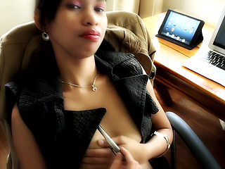 High heeled asian secretary teasing in the office