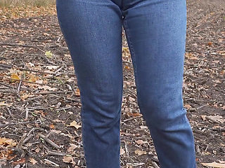 MILF Teasing Her Big Cameltoe in Blue Jeans Outdoors