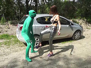 Suited slave gets punished outdoor from femdom chick