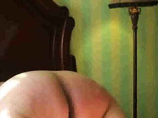 Lashing slut Mary's fat old ass with the belt