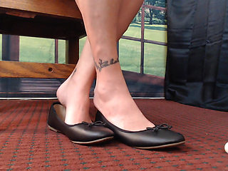 Close up ballet flats dangle play natural