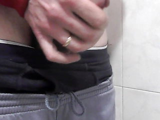 Big cumshot in a public bathroom