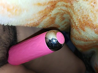Vibrator rubbing pussy
