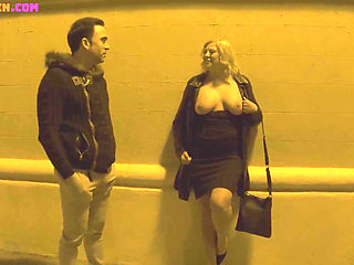 This Busty Mature Woman Goes Out on the Street with Her Tits Out Looking for Young Men to Fuck