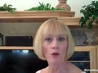Blonde grandma is tugging and sucking cock in POV
