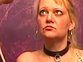 Tattooed Blonde MILF Endures Dungeon Spanking Session