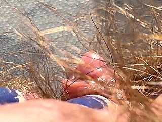 Amateur Hairy Girl Mastubates in Closeup with Huge Clit