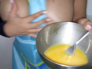 Big-bootied housewife invites her neighbor over and gives him a blowjob in the kitchen