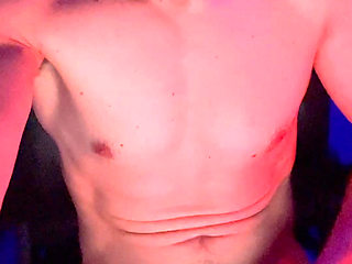 Athletic hunk jerking big cock