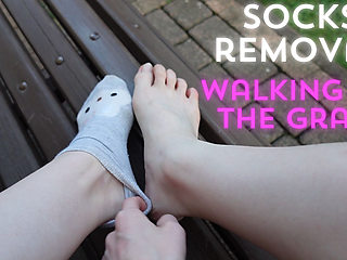 Socks Removal and Walk Barefoot on the Grass